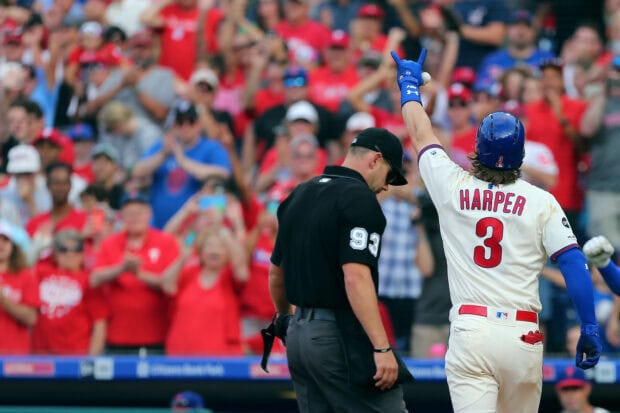 Bryce Harper of Philadelphia Phillies celebrates during a baseball game in front of cheering fans