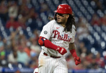 A Philadelphia Phillies baseball player running on the field during a game