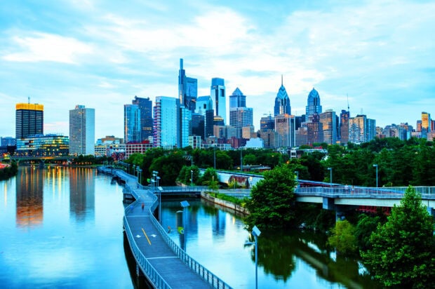 Philadelphia city skyline with river and modern buildings in a clear sky