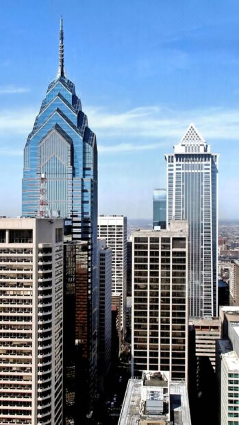 Modern Philly skyline with glass skyscrapers and clear blue sky in HD quality