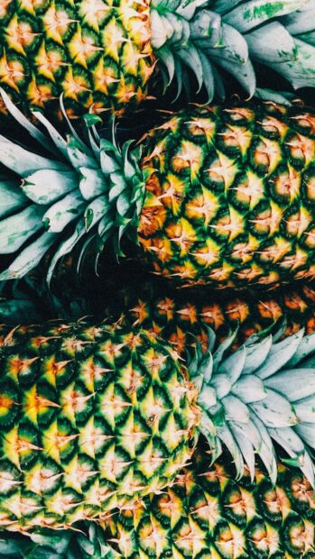Close up of ripe pineapple showing detailed texture and vibrant colors