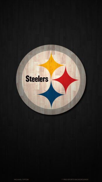 Steelers logo with three colored diamond shapes on wooden floor design