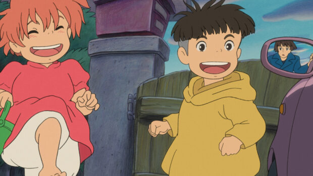Ponyo and Sosuke running happily outside near a car mirror with a surprised woman in the background
