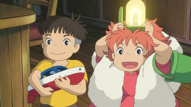 Ponyo and Sosuke playing happily inside a wooden room holding toys and a lamp