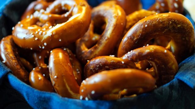 Fresh baked pretzels with coarse salt in a basket