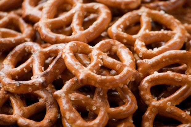 Close up of salted pretzel snacks with coarse salt crystals on top