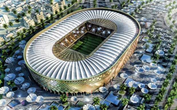 Aerial view of Qatar stadium with detailed architecture and crowd inside