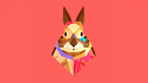 A colorful polygonal rabbit on a bright coral background in modern geometric style