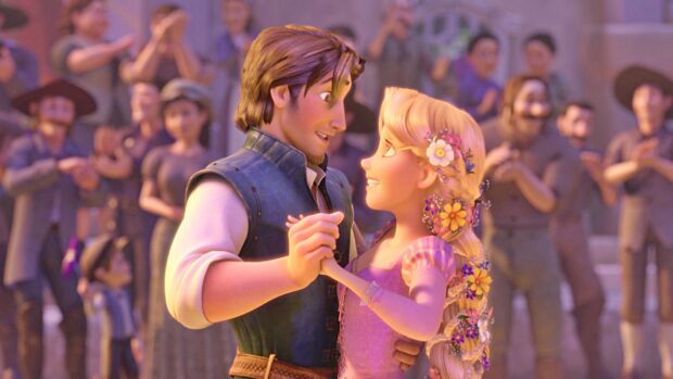 Rapunzel and Flynn Ryder sharing a dance surrounded by people in an animated scene