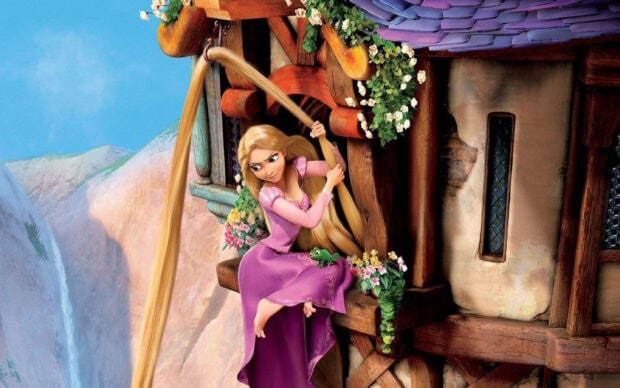 Rapunzel sitting on the wooden ledge holding her long hair near a tower with flowers and a chameleon nearby