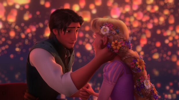 Rapunzel character with flowers in her hair sharing a tender moment with a man in a romantic setting