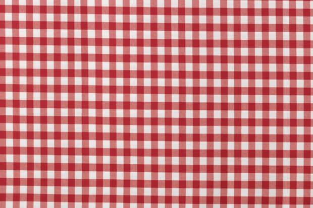 Red checked pattern with alternating red and white squares in a grid design