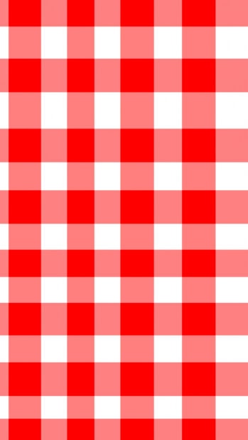 Red checked pattern with bright red and white squares in a seamless design