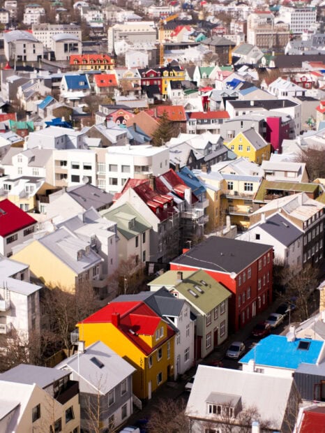 Colorful Reykjavik cityscape with diverse rooftops and buildings in spring
