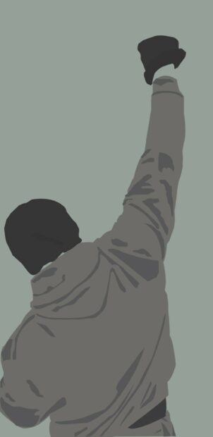 Rocky raising his fist in a victorious pose from behind wearing a jacket and glove