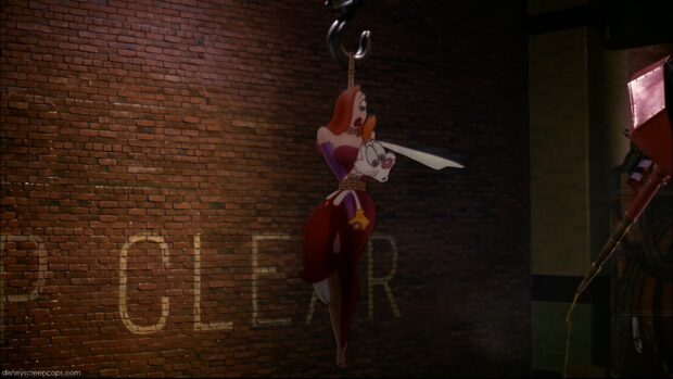 Roger Rabbit tied up with Jessica Rabbit hanging on a hook in a dark brick room