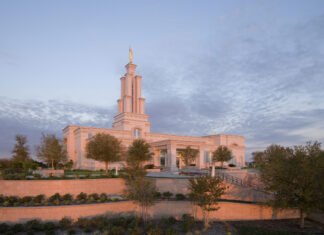 San Antonio Texas building surrounded by greenery under a cloudy sky