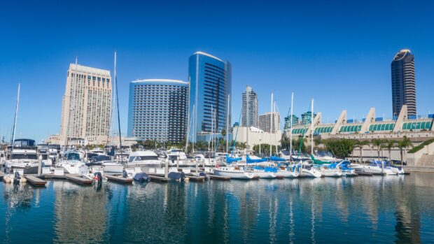 San Diego skyline with boats docked at the marina on a clear day