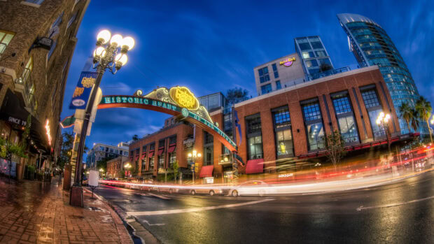 Night view of Gaslamp Quarter in San Diego California with historic buildings and street lights