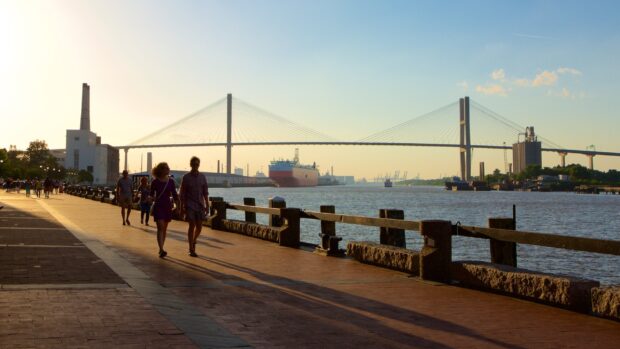 People Walking Along Waterfront in Savannah Georgia at Sunset