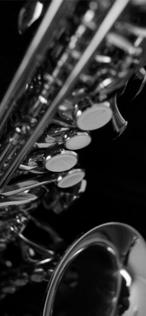 Close up view of saxophone keys showing intricate metal details and craftsmanship