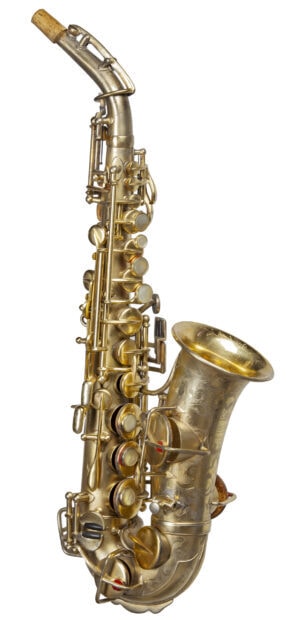 A vintage saxophone with detailed engravings and keys displayed on a white background