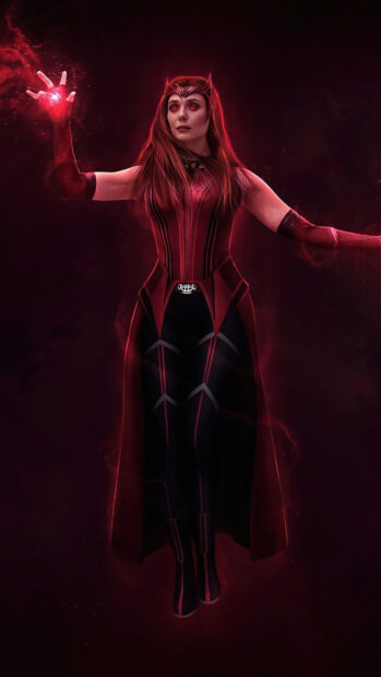 Scarlet Witch character with glowing red magic in dark costume standing with power