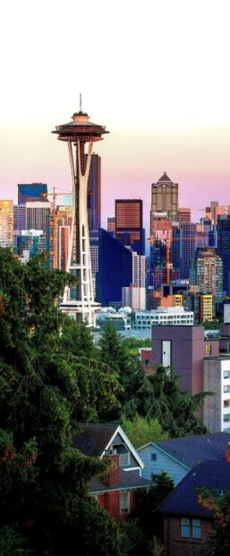 Seattle skyline with iconic space needle and vibrant cityscape at sunset
