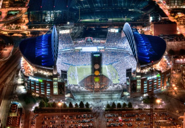 An aerial view of Seattle football stadium filled with fans during a night game