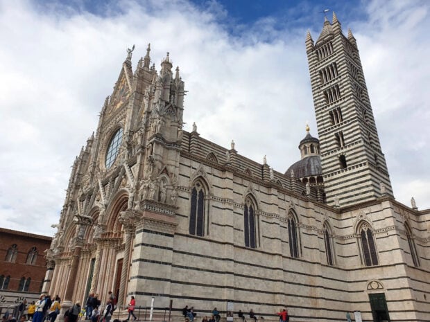 The historic Siena cathedral with detailed architecture in the city of Siena