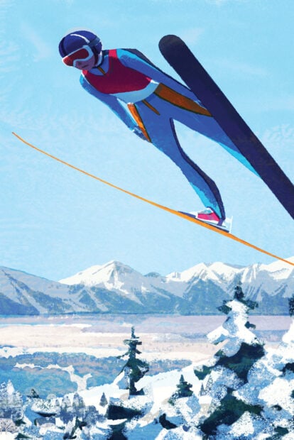 A ski jumper in midair above snowy trees and mountains during a ski jumping event