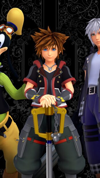 Sora holding the keyblade with Goofy and Riku standing beside him in Kingdom Hearts characters