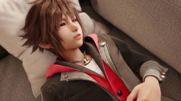 Sora from Kingdom Hearts lying on a couch wearing a jacket and necklace