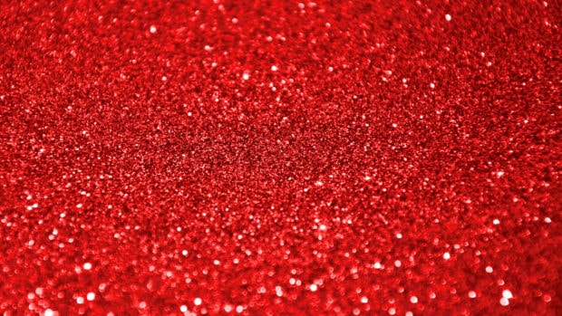 Sparkle texture with vibrant red glitter sparkling brightly