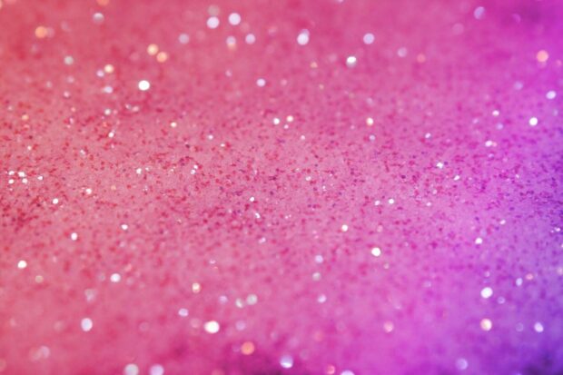 Close up of sparkle glitter texture with pink and purple shades