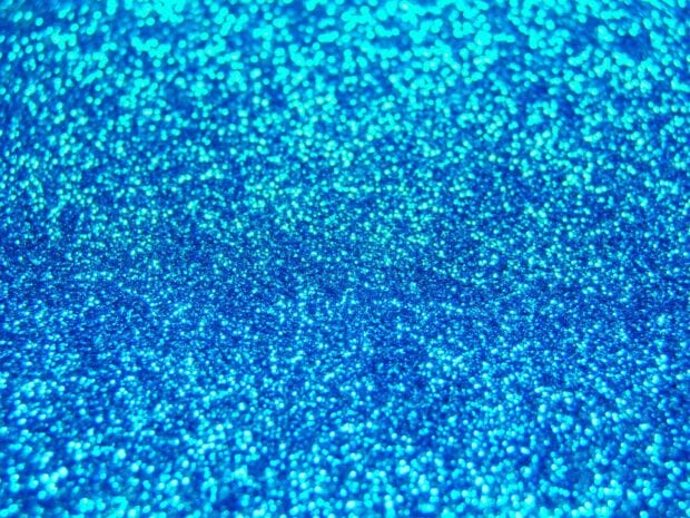 Sparkle texture with bright blue glitter creating a vibrant sparkle effect
