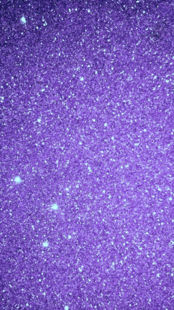 Purple sparkle texture with glitter effect on a vibrant surface