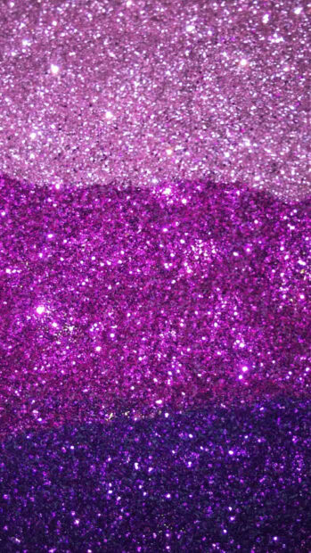 Shimmering layers of purple sparkle creating a glittery texture