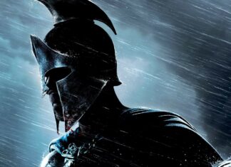 Spartan warrior wearing a battle helmet in the rain with a focused expression