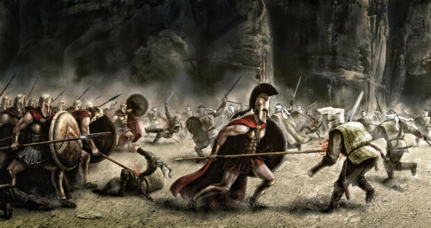 Spartan soldiers fight fiercely in a historic battle scene with spears and shields