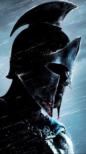 Spartan warrior helmet under the rain in a dramatic close up scene