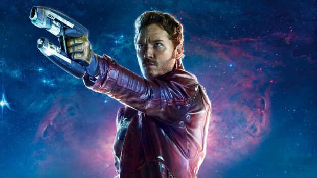 Star Lord in a red jacket aiming a futuristic weapon in space with a nebula background