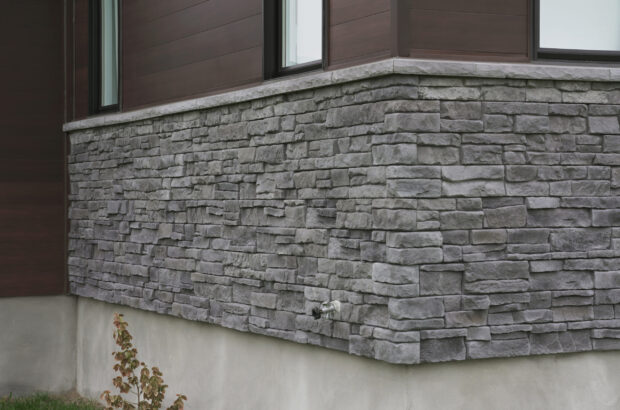 Grey stone wall cladding on the exterior of a modern house