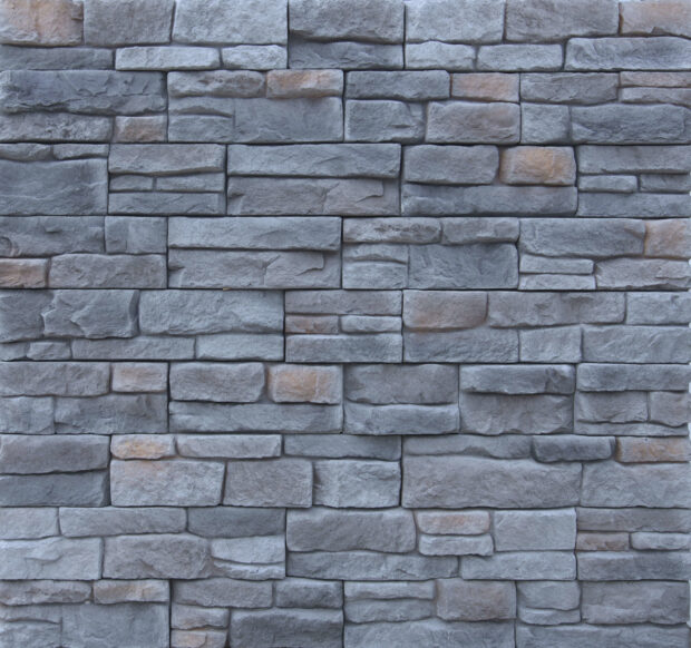 Seamless pattern of natural stone arranged in a decorative wall design