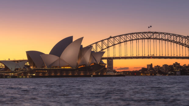 Sydney Opera House and Sydney Harbour Bridge at sunset in Sydney