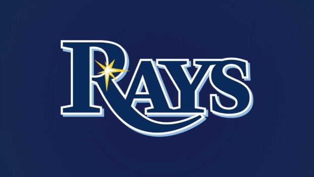 The Rays logo with a starburst design on a dark blue background representing Tampa Bay Rays