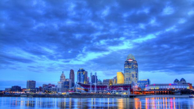 Beautiful Tennessee cityscape with vibrant sky and illuminated buildings reflecting on the water