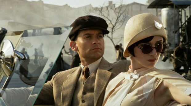 Gatsby era characters wearing vintage fashion in a classic car