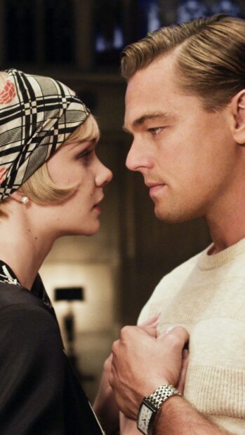 A close up of characters in a romantic moment from The Great Gatsby
