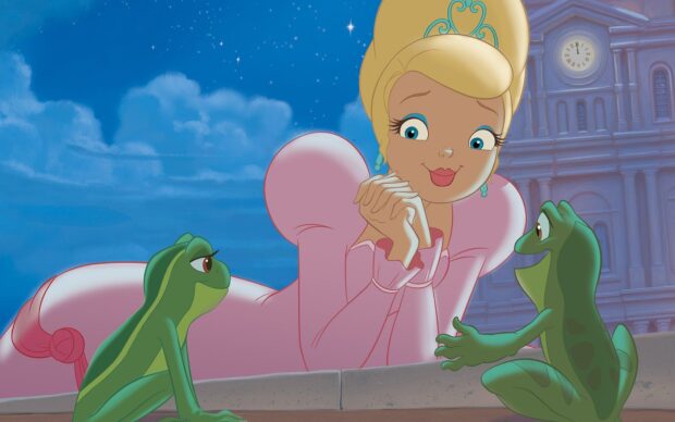 The princess from The Princess And The Frog talks to two frogs near the castle clock tower